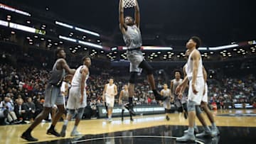 NEW YORK, NEW YORK - April 14: Mitchell Robinson #24 W. Kentucky dunks during the Jordan Brand Classic, National Boys Team All-Star basketball game at The Barclays Center on April 14, 2017 in New York City. (Photo by Tim Clayton/Corbis via Getty Images)