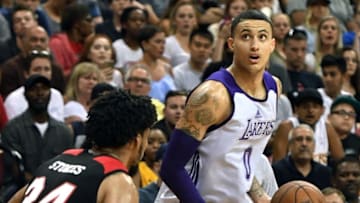 LAS VEGAS, NV - JULY 17: Jarnell Stokes #34 of the Portland Trail Blazers guards Kyle Kuzma #0 of the Los Angeles Lakers during the championship game of the 2017 Summer League at the Thomas & Mack Center on July 17, 2017 in Las Vegas, Nevada. Los Angeles won 110-98. NOTE TO USER: User expressly acknowledges and agrees that, by downloading and or using this photograph, User is consenting to the terms and conditions of the Getty Images License Agreement. (Photo by Ethan Miller/Getty Images)