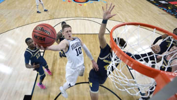 SAN ANTONIO, TX - APRIL 02: Donte DiVincenzo #10 of the Villanova Wildcats drives to the basket against the Michigan Wolverines during the first half of the 2018 NCAA Men's Final Four National Championship game at the Alamodome on April 2, 2018 in San Antonio, Texas. (Photo by Brett Wilhelm/NCAA Photos via Getty Images)