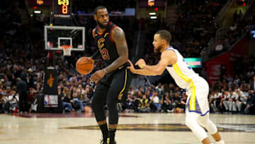 CLEVELAND, OH - JUNE 08: LeBron James #23 of the Cleveland Cavaliers drives to the basket defended by Stephen Curry #30 of the Golden State Warriors during Game Four of the 2018 NBA Finals at Quicken Loans Arena on June 8, 2018 in Cleveland, Ohio. NOTE TO USER: User expressly acknowledges and agrees that, by downloading and or using this photograph, User is consenting to the terms and conditions of the Getty Images License Agreement. (Photo by Gregory Shamus/Getty Images)