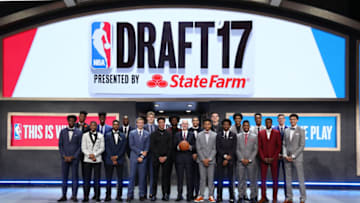 BROOKLYN, NY - JUNE 22: Front Row (L-R) - OG Anunoby, Dennis Smith, Malik Monk, Luke Kennard, Lonzo Ball, NBA Commissioner Adam Silver, Markelle Fultz, De'aaron Fox, Frank Ntilikina, Justin Jackson, Back Row (L-R) Bam Adebayo, Jonathan Isaac, Justin Patton, Lauri Markkanen, Jayson Tatum, Josh Jackson, Zach Collins, Donovan Mitchell and TJ Leaf pose for a portrait prior to the 2017 NBA Draft on June 22, 2017 at Barclays Center in Brooklyn, New York. NOTE TO USER: User expressly acknowledges and agrees that, by downloading and or using this photograph, User is consenting to the terms and conditions of the Getty Images License Agreement. Mandatory Copyright Notice: Copyright 2017 NBAE (Photo by Nathaniel S. Butler /NBAE via Getty Images)