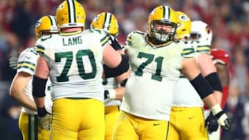 Jan 16, 2016; Glendale, AZ, USA; Green Bay Packers guard Josh Sitton (71) and T.J. Lang (70) against the Arizona Cardinals during the NFC Divisional round playoff game at University of Phoenix Stadium. Mandatory Credit: Mark J. Rebilas-USA TODAY Sports