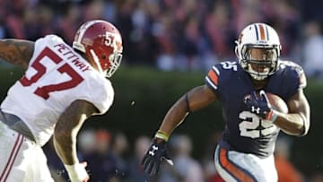 Nov 28, 2015; Auburn, AL, USA; Auburn Tigers running back Peyton Barber (25) carries against the Alabama Crimson Tide during the first half at Jordan Hare Stadium. Mandatory Credit: John Reed-USA TODAY Sports