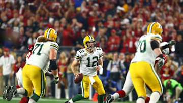 Jan 16, 2016; Glendale, AZ, USA; Green Bay Packers quarterback Aaron Rodgers (12) against the Arizona Cardinals during the NFC Divisional round playoff game at University of Phoenix Stadium. Mandatory Credit: Mark J. Rebilas-USA TODAY Sports