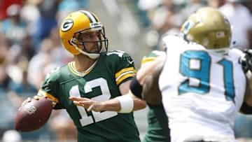 Sep 11, 2016; Jacksonville, FL, USA; Green Bay Packers quarterback Aaron Rodgers (12) looks to pass the ball in the second quarter against the Jacksonville Jaguars at EverBank Field. Mandatory Credit: Logan Bowles-USA TODAY Sports