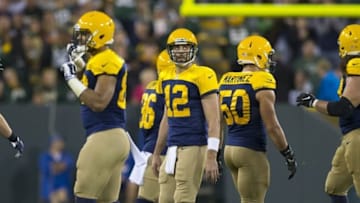 Oct 16, 2016; Green Bay, WI, USA; Green Bay Packers quarterback Aaron Rodgers (12) looks to the scoreboard following a turnover during the fourth quarter against the Dallas Cowboys at Lambeau Field. The Cowboys won 30-16. Mandatory Credit: Jeff Hanisch-USA TODAY Sports
