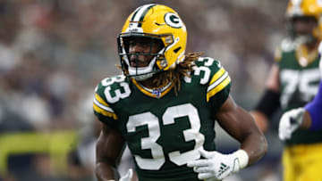 ARLINGTON, TEXAS - OCTOBER 06: Aaron Jones #33 of the Green Bay Packers reacts after a play against the Dallas Cowboys in the first quarter of their game at AT&T Stadium on October 06, 2019 in Arlington, Texas. (Photo by Ronald Martinez/Getty Images)