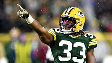 GREEN BAY, WISCONSIN - NOVEMBER 10: Aaron Jones #33 of the Green Bay Packers celebrates a first down against the Carolina Panthers during the third quarter in the game at Lambeau Field on November 10, 2019 in Green Bay, Wisconsin. (Photo by Stacy Revere/Getty Images)
