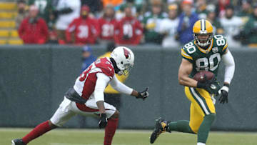 GREEN BAY, WISCONSIN - DECEMBER 02: Jimmy Graham #80 of the Green Bay Packers is tackled by David Amerson #38 of the Arizona Cardinals during the second half of a game at Lambeau Field on December 02, 2018 in Green Bay, Wisconsin. (Photo by Dylan Buell/Getty Images)