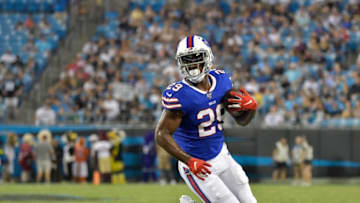 CHARLOTTE, NORTH CAROLINA - AUGUST 16: T.J. Yeldon #29 of the Buffalo Bills runs against the Carolina Panthers during the second quarter of their preseason game at Bank of America Stadium on August 16, 2019 in Charlotte, North Carolina. (Photo by Grant Halverson/Getty Images)