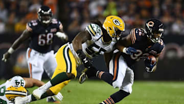 CHICAGO, ILLINOIS - SEPTEMBER 05: David Montgomery #32 of the Chicago Bears is pursued by Za'Darius Smith #55 of the Green Bay Packers during the first half at Soldier Field on September 05, 2019 in Chicago, Illinois. (Photo by Stacy Revere/Getty Images)