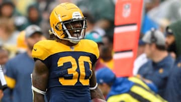 GREEN BAY, WISCONSIN - SEPTEMBER 22: Jamaal Williams #30 of the Green Bay Packers reacts after running for a first down in the fourth quarter against the Denver Broncos at Lambeau Field on September 22, 2019 in Green Bay, Wisconsin. (Photo by Quinn Harris/Getty Images)