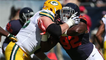 CHICAGO, IL - SEPTEMBER 13: Pernell McPhee #92 of the Chicago Bears rushes against Bryan Bulaga #75 of the Green Bay Packers in the first half at Soldier Field on September 13, 2015 in Chicago, Illinois. (Photo by Jonathan Daniel/Getty Images)