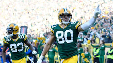GREEN BAY, WISCONSIN - OCTOBER 20: Jimmy Graham #80 of the Green Bay Packers reacts after his touchdown in the second half against the Oakland Raiders at Lambeau Field on October 20, 2019 in Green Bay, Wisconsin. (Photo by Quinn Harris/Getty Images)