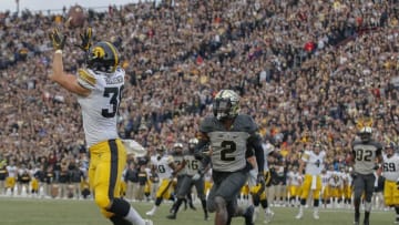 WEST LAFAYETTE, IN - NOVEMBER 03: T.J. Hockenson #38 of the Iowa Hawkeyes catches a touchdown pass in the end zone as Kenneth Major #2 of the Purdue Boilermakers defends at Ross-Ade Stadium on November 3, 2018 in West Lafayette, Indiana. (Photo by Michael Hickey/Getty Images)