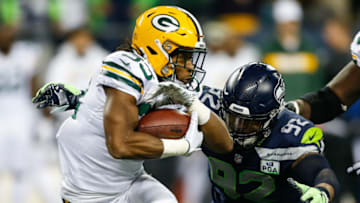SEATTLE, WA - NOVEMBER 15: Aaron Jones #33 of the Green Bay Packers runs the ball in the second quarter against the Seattle Seahawks at CenturyLink Field on November 15, 2018 in Seattle, Washington. (Photo by Otto Greule Jr/Getty Images)