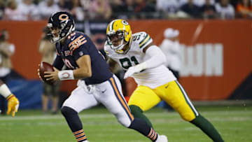 CHICAGO, ILLINOIS - SEPTEMBER 05: Mitchell Trubisky #10 of the Chicago Bears runs with the ball as he is pursued by Preston Smith #91 of the Green Bay Packers during the first quarter in the game at Soldier Field on September 05, 2019 in Chicago, Illinois. (Photo by Jonathan Daniel/Getty Images)