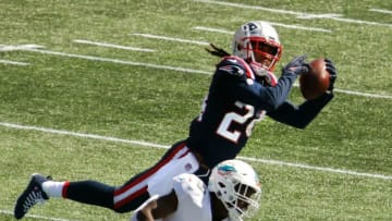 [The Providence Journal / Kris Craig] Original Caption: Foxboro, RI, Sept 13, 2020 - Patriots Stephen Gilmore intercepts a pass meant for Miami's Preston Williams in the first half. Patriots season opener against the Miami Dolphins at Gillette stadium Sunday afternoon. [The Providence Journal / Kris Craig]Pats Defense Ruins The Fitzmagic Show