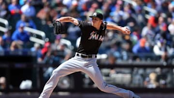 Apr 13, 2016; New York City, NY, USA; Miami Marlins starting pitcher Adam Conley (61) pitches against the New York Mets during the second inning at Citi Field. Mandatory Credit: Brad Penner-USA TODAY Sports