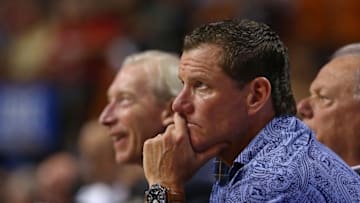 Oct 28, 2015; Miami, FL, USA; Florida Marlins former player Jeff Conine (right) watches a game between the Charlotte Hornets and the Miami Heat during the first half at American Airlines Arena. Mandatory Credit: Steve Mitchell-USA TODAY Sports