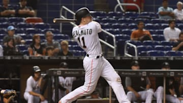 MIAMI, FL - SEPTEMBER 4: J.T. Realmuto #11 of the Miami Marlins hits a home run in the eighth inning against the Philadelphia Phillies at Marlins Park on September 4, 2018 in Miami, Florida. (Photo by Eric Espada/Getty Images)