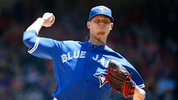ARLINGTON, TX - MAY 5: Clay Buchholz #36 of the Toronto Blue Jays throws against the Texas Rangers during the first inning at Globe Life Park in Arlington on May 5, 2019 in Arlington, Texas. (Photo by Ron Jenkins/Getty Images)