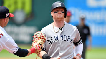 CLEVELAND, OHIO - JUNE 09: First baseman Jake Bauers #10 of the Cleveland Indians catches Clint Frazier #77 of the New York Yankees in a run down during the third inning at Progressive Field on June 09, 2019 in Cleveland, Ohio. (Photo by Jason Miller/Getty Images)
