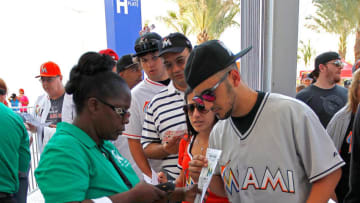 MIAMI, FL - APRIL 04: A fans has his ticket scanned as he enters the stadium for Opening Day between the Miami Marlins and the St. Louis Cardinals at Marlins Park on April 4, 2012 in Miami, Florida. (Photo by Mike Ehrmann/Getty Images)