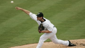 MIAMI - AUGUST 1: Pitcher Carl Pavano #45 of the Florida Marlins delivers against the Montreal Expos during the game on August 1, 2004 at Pro Player Stadium in Miami, Florida. The game was posponed due to rain. (Photo by Eliot J. Schechter/Getty Images)
