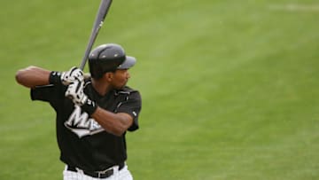 JUPITER, FL - MARCH 3 : Outfielder Juan Encarnacion #43 of the Florida Marlins bats against the Baltimore Orioles during a spring training game on March 3, 2005 at Roger Dean Stadium in Jupiter, Florida. The Baltimore Orioles defeated the Florida Marlins 8-4. (Photo by Elsa/Getty Images)