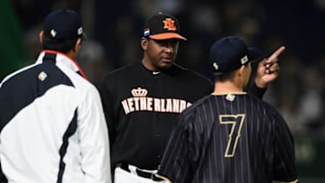 TOKYO, JAPAN - MARCH 12: Manager Hensley Meulens #31 of the Netherlands talks with Outfielder Norichika Aoki #7 and coach Coach Atsunori Inaba #80 prior to the World Baseball Classic Pool E Game Two between Japan and Netherlands at the Tokyo Dome on March 12, 2017 in Tokyo, Japan. (Photo by Matt Roberts/Getty Images)