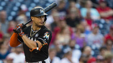 WASHINGTON, DC - AUGUST 09: Giancarlo Stanton #27 of the Miami Marlins hits against the Washington Nationals in the first inning during a game at Nationals Park on August 9, 2017 in Washington, DC. (Photo by Patrick McDermott/Getty Images)