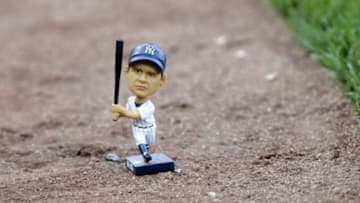 Sep 1, 2015; Boston, MA, USA; A bobble head doll of Babe Ruth on the field prior to a game between the Boston Red Sox and New York Yankees at Fenway Park. Mandatory Credit: Bob DeChiara-USA TODAY Sports