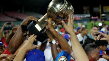 Dominican Republic's players celebrate with the championship trophy after defeating Venezuela during the Caribbean Series baseball tournament championship game at the Hiram Bithorn stadium in San Juan, Puerto Rico on February 7, 2020. (Photo by Ricardo ARDUENGO / AFP) (Photo by RICARDO ARDUENGO/AFP via Getty Images)