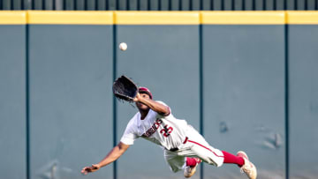 Christian Franklin of the Arkansas Razorbacks makes a diving catch. (Photo by Wesley Hitt/Getty Images)