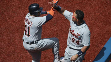 TORONTO, CANADA - JULY 9: Victor Martinez #41 of the Detroit Tigers is congratulated by Miguel Cabrera #24 after hitting a solo home run in the eighth inning during MLB game action against the Toronto Blue Jays on July 9, 2016 at Rogers Centre in Toronto, Ontario, Canada. (Photo by Tom Szczerbowski/Getty Images)