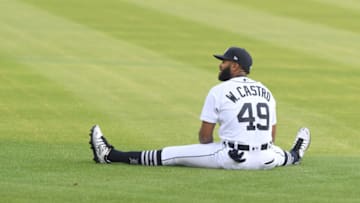 DETROIT, MI - AUGUST 24: Willi Castro #49 of the Detroit Tigers stretches in the outfield while warming up prior to the start of the game against the Chicago Cubs at Comerica Park on August 24, 2020 in Detroit, Michigan. The Cubs defeated the Tigers 9-3. (Photo by Mark Cunningham/MLB Photos via Getty Images)