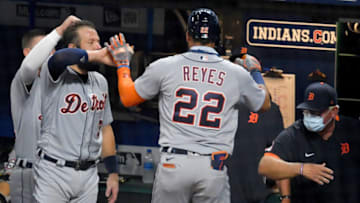 CLEVELAND, OHIO - AUGUST 21: Austin Romine #7 and manager Ron Gardenhire celebrate with Victor Reyes #22 of the Detroit Tigers after Reyes hit a home run during the seventh inning against the Cleveland Indians at Progressive Field on August 21, 2020 in Cleveland, Ohio. The Tigers defeated the Indians 10-5. (Photo by Jason Miller/Getty Images)