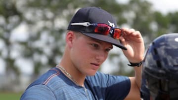 Tigers outfield prospect Parker Meadows talks with a teammate during spring training Wednesday, Feb. 20, 2019, at Joker Marchant Stadium in Lakeland, Fla.