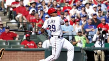 Oct 12, 2015; Arlington, TX, USA; Texas Rangers third baseman Adrian Beltre (29) singles against the Toronto Blue Jays during the first inning in game four of the ALDS at Globe Life Park in Arlington. Mandatory Credit: Tim Heitman-USA TODAY Sports