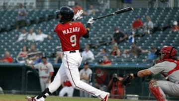 Aug 7, 2014; Frisco, TX, USA; Frisco Rough Riders right fielder Nomar Mazara (9) bats during the game against the Springfield Cardinals at Dr Pepper Ballpark. Springfield beat Frisco 2-1. Mandatory Credit: Tim Heitman-USA TODAY Sports