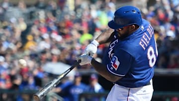 Mar 12, 2016; Surprise, AZ, USA; Texas Rangers designated hitter Prince Fielder (84) hits a pitch during the fourth inning against the Oakland Athletics at Surprise Stadium. Mandatory Credit: Joe Camporeale-USA TODAY Sports
