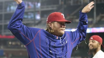 Apr 26, 2016; Arlington, TX, USA; Texas Rangers starting pitcher A.J. Griffin (64) celebrates his teams win against the New York Yankees at Globe Life Park in Arlington. The Rangers won 10-1. Mandatory Credit: Jim Cowsert-USA TODAY Sports