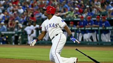 Apr 27, 2016; Arlington, TX, USA; Texas Rangers third baseman Adrian Beltre (29) hits an rbi single during the third inning against the New York Yankees at Globe Life Park in Arlington. Mandatory Credit: Kevin Jairaj-USA TODAY Sports