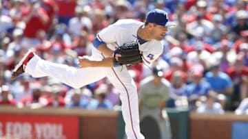 Apr 4, 2016; Arlington, TX, USA; Texas Rangers starting pitcher Cole Hamels (35) throws a pitch in the fifth inning against the Seattle Mariners at Globe Life Park in Arlington. Mandatory Credit: Tim Heitman-USA TODAY Sports