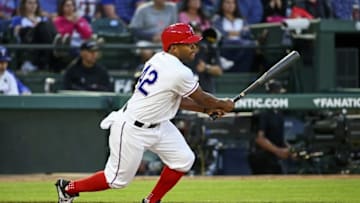 Apr 15, 2016; Arlington, TX, USA; Texas Rangers center fielder Delino DeShields hits a two run single during the second inning against the Baltimore Orioles at Globe Life Park in Arlington. Mandatory Credit: Kevin Jairaj-USA TODAY Sports