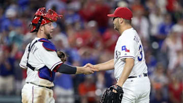 Apr 21, 2016; Arlington, TX, USA; Texas Rangers relief pitcher Shawn Tolleson (37) celebrates with catcher Bryan Holaday (8) after the game against the Houston Astros at Globe Life Park in Arlington. Mandatory Credit: Kevin Jairaj-USA TODAY Sports