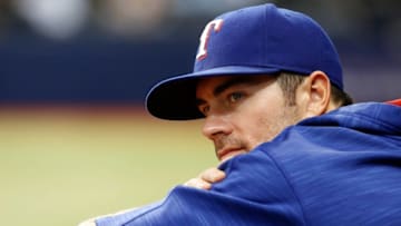 Aug 20, 2016; St. Petersburg, FL, USA; Texas Rangers starting pitcher Cole Hamels (35) in the dugout against the Tampa Bay Rays at Tropicana Field. Mandatory Credit: Kim Klement-USA TODAY Sports