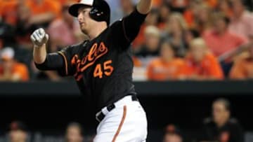 Sep 23, 2016; Baltimore, MD, USA; Baltimore Orioles outfielder Mark Trumbo (45) hits the game winning home run to beat the Arizona Diamondbacks 3-2 in twelve inning at Oriole Park at Camden Yards. Mandatory Credit: Evan Habeeb-USA TODAY Sports