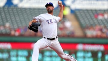 ARLINGTON, TX - JULY 23: Cole Hamels #35 of the Texas Rangers pitches against the Oakland Athletics in the top of the first inning at Globe Life Park in Arlington on July 23, 2018 in Arlington, Texas. (Photo by Tom Pennington/Getty Images)